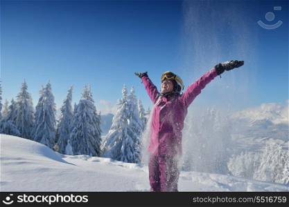happy young ski woman at mountaint top on winter have fun