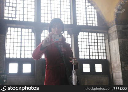 happy young tourist woman travel visit ancient istambul in turkey and old ayasofya blue mosque