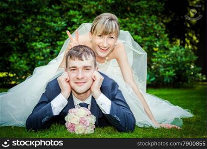 Happy young wedding couple on picnic