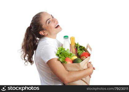 Happy Young Woman Carrying a Shopping Bag Full of Groceries at White Background