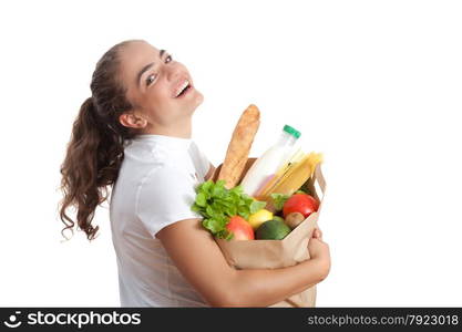 Happy Young Woman Carrying a Shopping Bag Full of Groceries at White Background