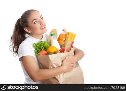 Happy Young Woman Carrying a Shopping Bag Full of Groceries at White Background
