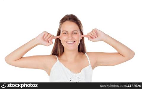 Happy young woman covering her ears isolated on a white background