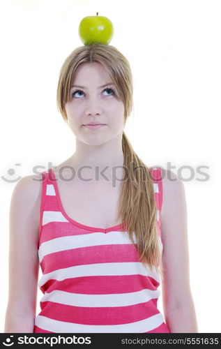 happy young woman eat green apple isolated on white backround in studio