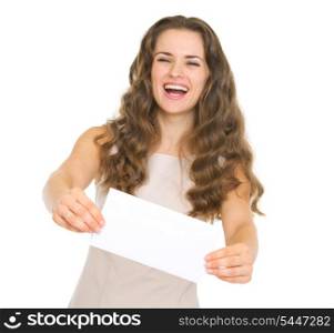Happy young woman giving envelope