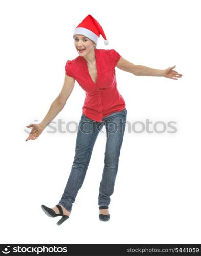 Happy young woman in Christmas hat funny posing on white