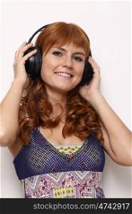 happy young woman listening to music