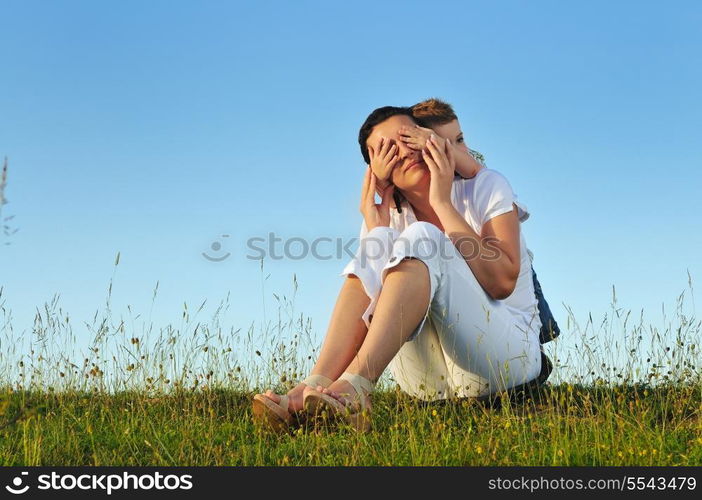 happy young woman mother play and outdoor with beautiful child