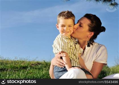 happy young woman mother play and outdoor with beautiful child