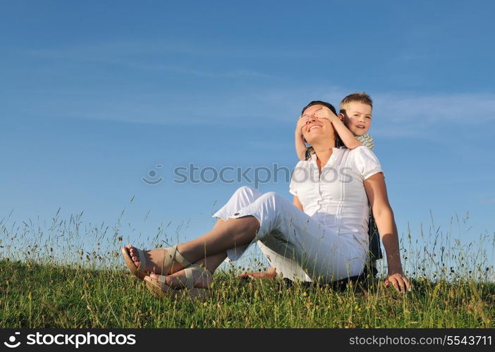 happy young woman mother play and outdoor with beautiful child