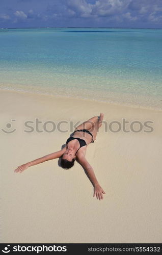 happy young woman on summer vacation on beautiful tropical beach have fun and relax