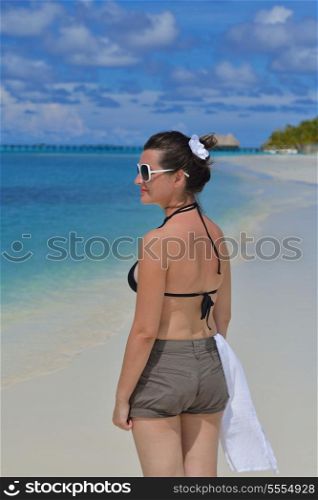 happy young woman on summer vacation on beautiful tropical beach have fun and relax