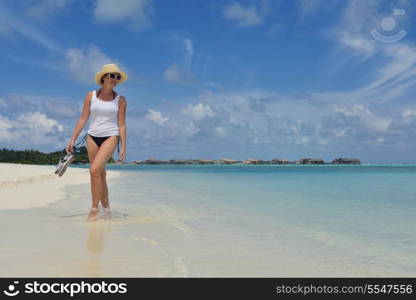 happy young woman on summer vacation on beautiful tropical beach have fun enjoy and relax