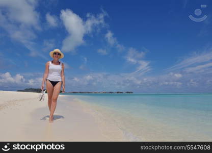 happy young woman on summer vacation on beautiful tropical beach have fun enjoy and relax