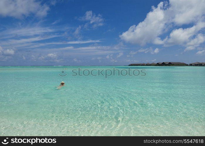 happy young woman on summer vacation on beautiful tropical beach have fun enjoy and relax