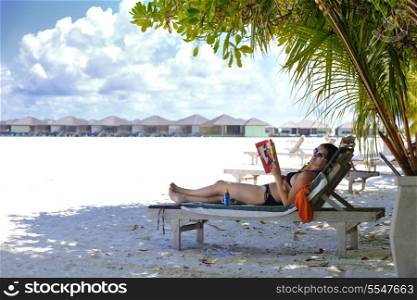 happy young woman on summer vacation on beautiful tropical beach have fun enjoy and relax