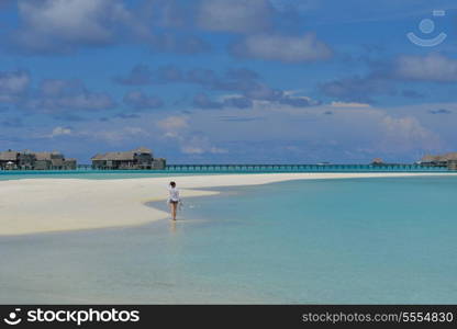 happy young woman on summer vacation on beautiful tropical beach have fun enjoy and relax