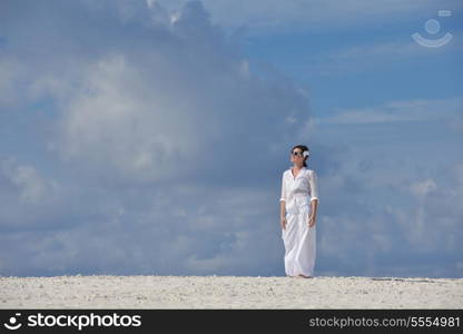 happy young woman on summer vacation on beautiful tropical beach have fun enjoy and relax