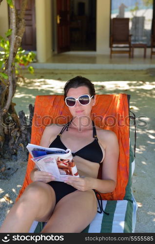 happy young woman on summer vacation on beautiful tropical beach have fun enjoy and relax