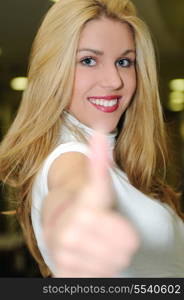 happy young woman posing indoor