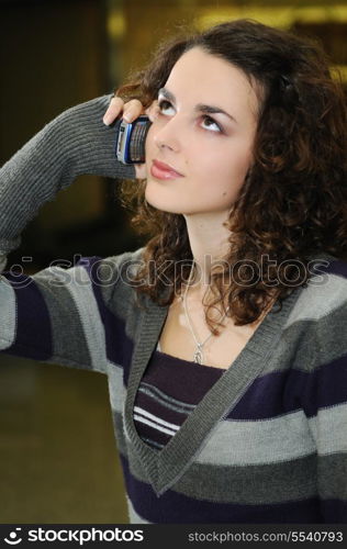 happy young woman posing indoor