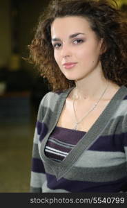 happy young woman posing indoor