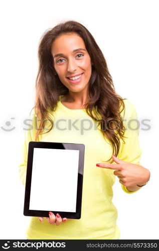 Happy young woman presenting your product in a tablet computer