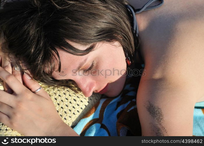 happy young woman relax on beautiful beach at fresh summer morning and enjoy first ray of sun