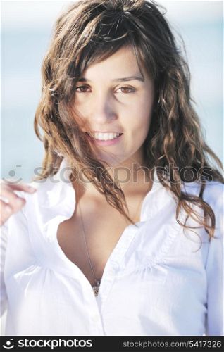 happy young woman relax onbeautiful beach at morning