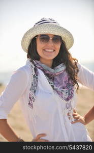 happy young woman relax onbeautiful beach at morning