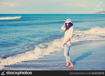 happy young woman relax onbeautiful beach at morning