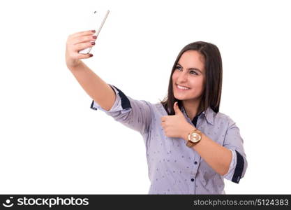 Happy young woman taking self portrait photography through smart phone over white background.