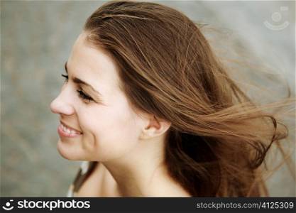 happy young woman, toned photo f/x, selective focus on eye