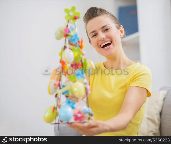 Happy young woman with Easter decoration