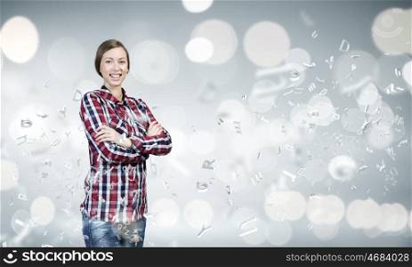 Happy young woman. Young pretty woman in casual against bokeh background