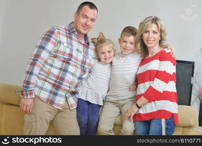 hapy young family have fun with their children at modern living room home indoors