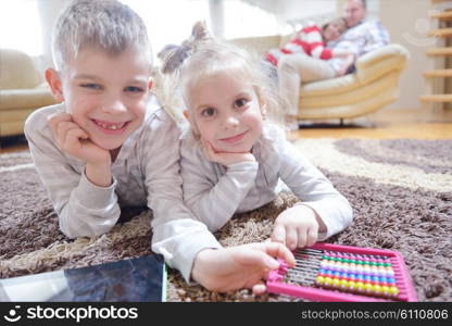 hapy young family have fun with their children at modern living room home indoors