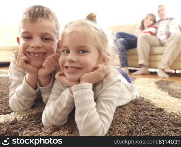 hapy young family have fun with their children at modern living room home indoors