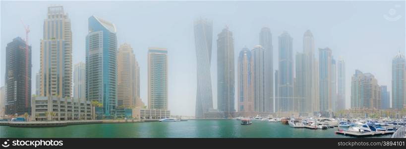 Harbor for recreational boats in Dubai Marina, with the skyscrapers in the background