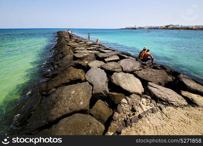 harbor pier boat in the blue sky arrecife teguise lanzarote spain