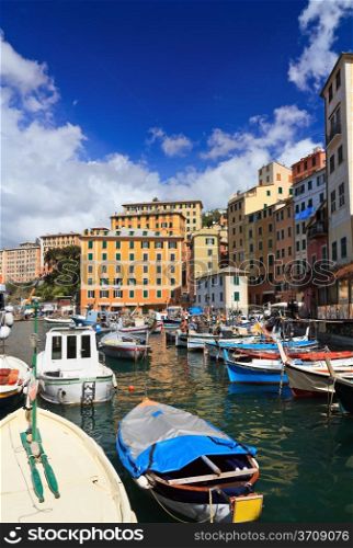 harbor with fishing boats in Camogli, famous small town in Liguria, Italy