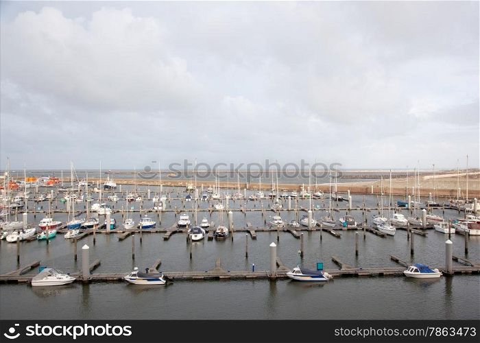 harbour with yachts at IJmuiden in the netherlands in winter time