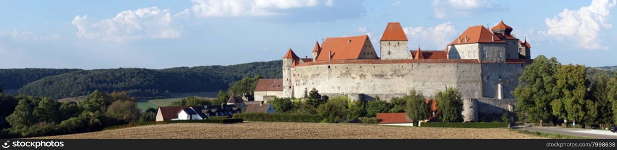 HARBURG, GERMANY - CIRCA AUGUST 2015 Schloss Harburg castle and farm field