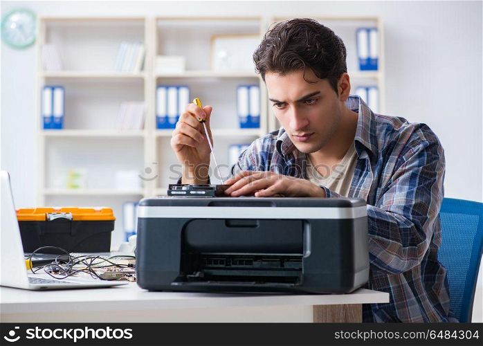 Hardware repairman repairing broken printer fax machine