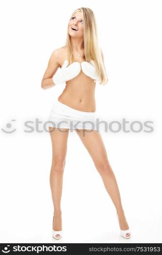 Harmonous blonde covers a breast with the mittens, isolated