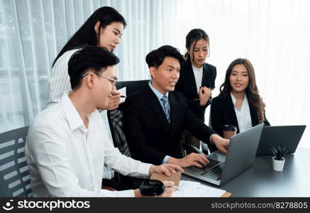 Harmony in office concept as business people analyzing dashboard paper together in workplace. Young colleagues give ideas at manager desk for discussion or strategy planning about project.. Office worker and manager analyze financial report paper in harmony workplace.