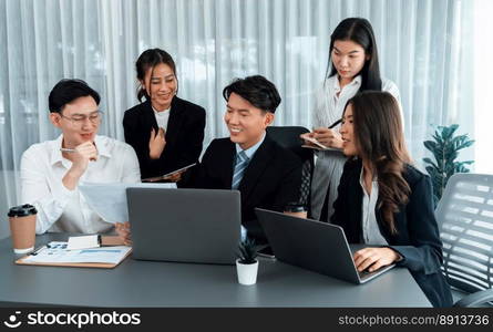 Harmony in office concept as business people analyzing dashboard paper together in workplace. Young colleagues give ideas at manager desk for discussion or strategy planning about project.. Office worker and manager analyze financial report paper in harmony workplace.