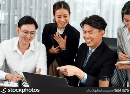 Harmony in office concept as business people analyzing dashboard paper together in workplace. Young colleagues give ideas at manager desk for discussion or strategy planning about project.. Office worker and manager analyze financial report paper in harmony workplace.