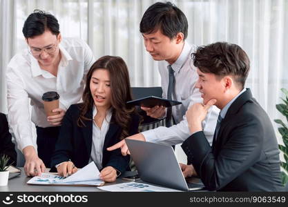 Harmony in office concept as business people analyzing dashboard paper together in workplace. Young colleagues give ideas at manager desk for discussion or strategy planning about project.. Office worker and manager analyze financial report paper in harmony workplace.