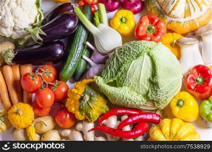 Harvest of many various colorful vegetables background. Harvest vegetables background